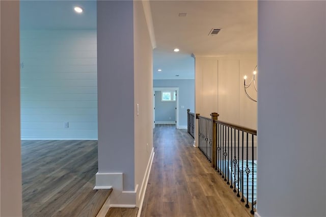 6449 Snelling Mill Rd, Flowery Branch, GA 30542 - hall featuring wood finished floors, recessed lighting, and baseboards