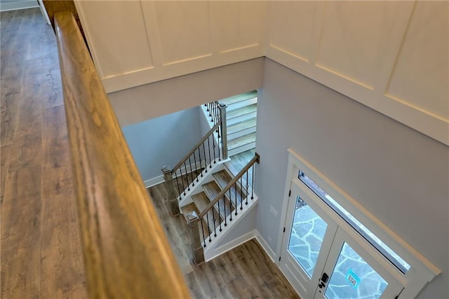 6449 Snelling Mill Rd, Flowery Branch, GA 30542 - stairs with wood finished floors