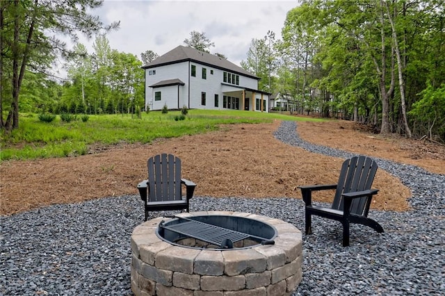 6449 Snelling Mill Rd, Flowery Branch, GA 30542 - view of yard with an outdoor fire pit