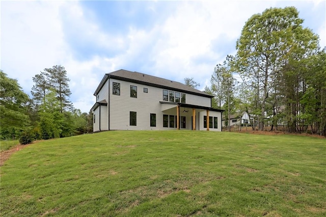 6449 Snelling Mill Rd, Flowery Branch, GA 30542 - rear view of property with a lawn