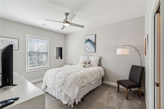 carpeted bedroom with ceiling fan