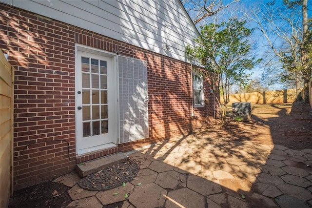 view of patio / terrace featuring fence