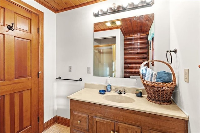 bathroom featuring vanity, wooden ceiling, and crown molding