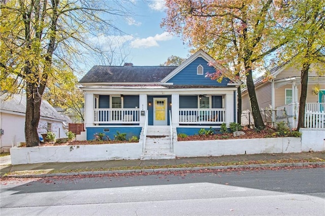 bungalow-style home with a porch