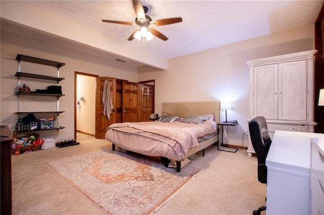 bedroom featuring ceiling fan and light colored carpet