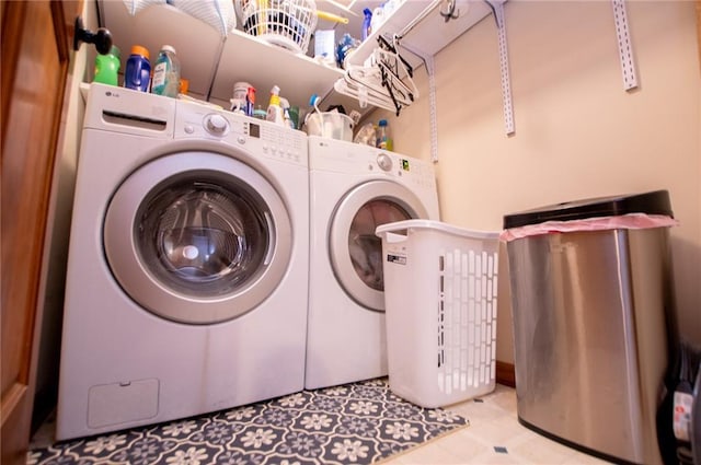 laundry area with separate washer and dryer and laundry area