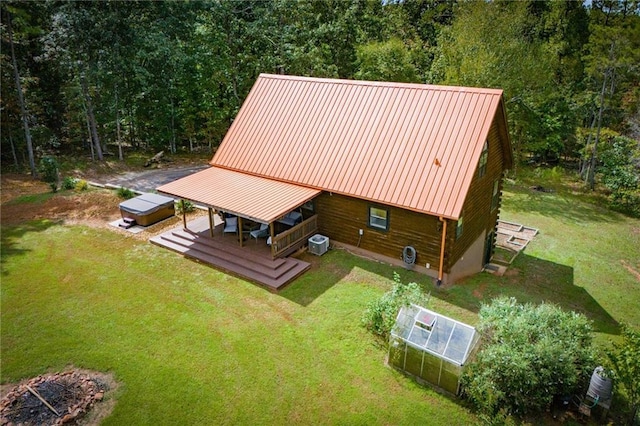 aerial view featuring a view of trees