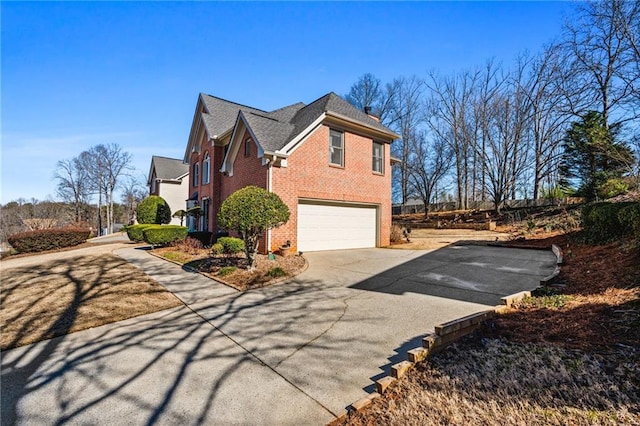 view of property exterior with a garage