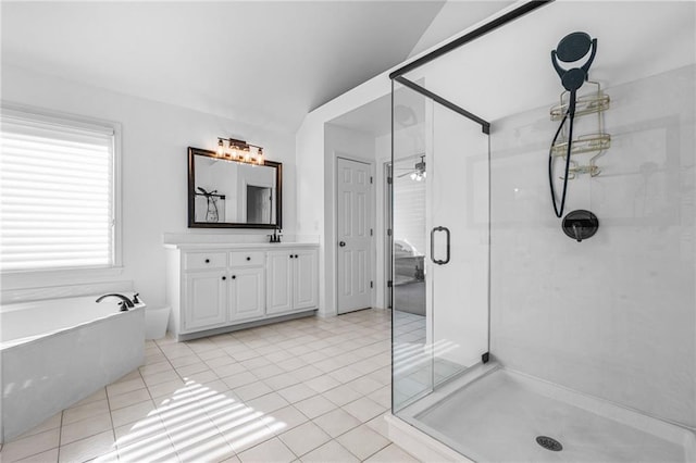 bathroom with ceiling fan, vanity, shower with separate bathtub, and tile patterned floors