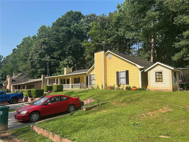 2128 Valley Oaks Dr, Smyrna, GA 30080 - single story home featuring a front yard and a chimney
