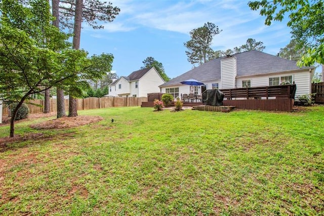 view of yard with a deck