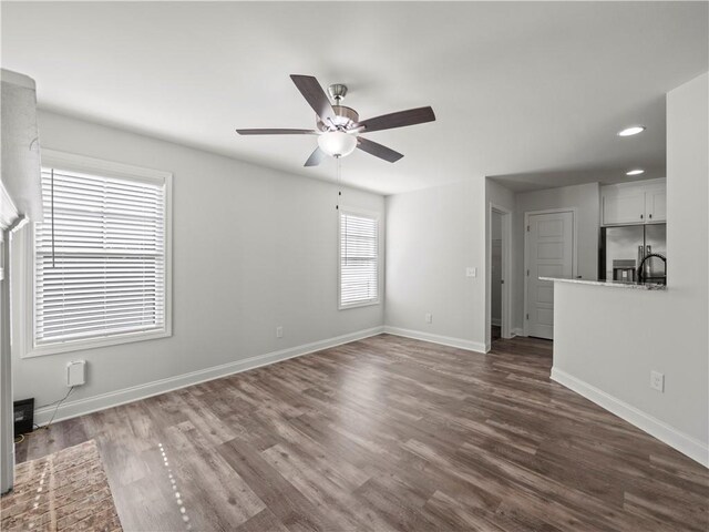 385 Finch Landing Rd, Winder, GA 30680 - unfurnished living room with recessed lighting, dark wood-style floors, baseboards, and a ceiling fan