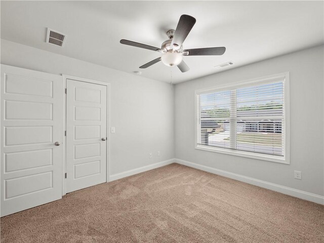 385 Finch Landing Rd, Winder, GA 30680 - carpeted empty room featuring baseboards, a ceiling fan, and visible vents