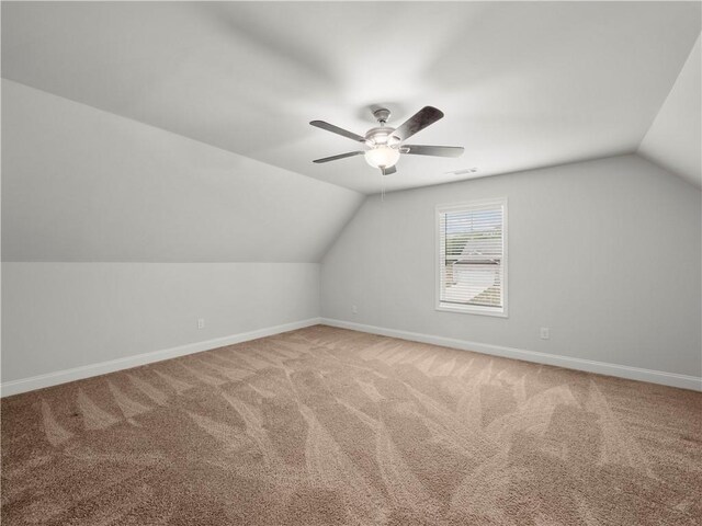 385 Finch Landing Rd, Winder, GA 30680 - additional living space featuring baseboards, a ceiling fan, carpet, and vaulted ceiling