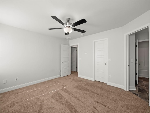 385 Finch Landing Rd, Winder, GA 30680 - unfurnished bedroom featuring carpet flooring, baseboards, and a ceiling fan