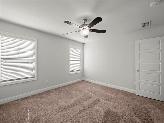 385 Finch Landing Rd, Winder, GA 30680 - carpeted empty room with visible vents, ceiling fan, and baseboards