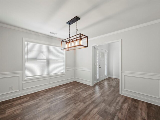 385 Finch Landing Rd, Winder, GA 30680 - unfurnished dining area featuring a decorative wall, visible vents, an inviting chandelier, and crown molding