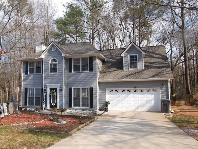 view of front of property featuring a garage