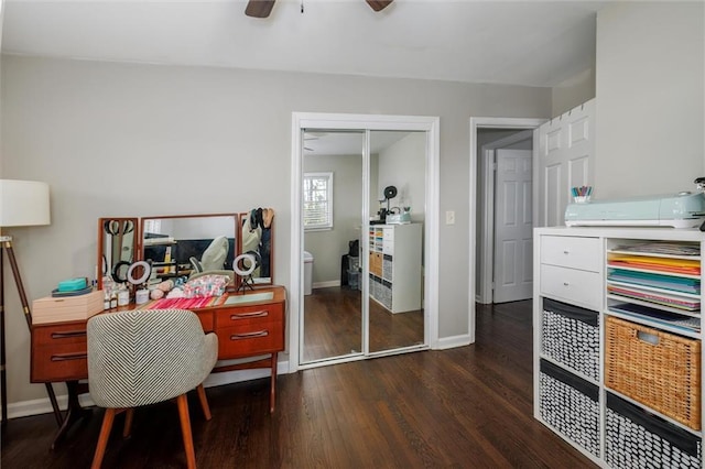 office with a ceiling fan, baseboards, and wood finished floors