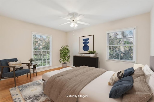 bedroom with wood finished floors