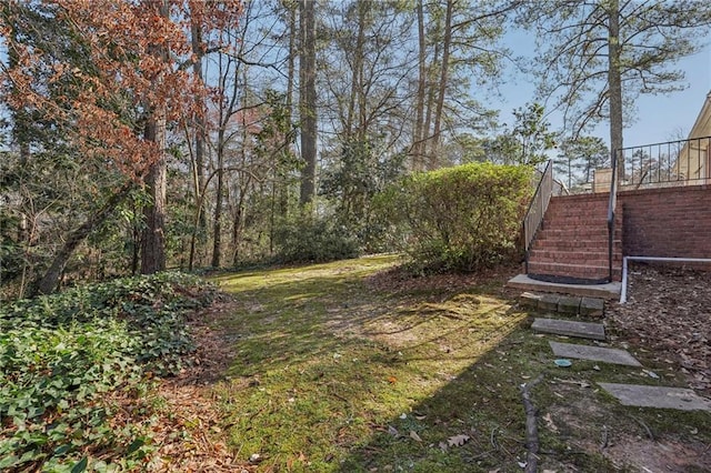 view of yard featuring stairway