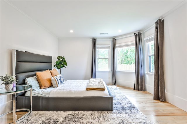 bedroom featuring light hardwood / wood-style flooring