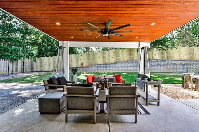 view of patio with ceiling fan and an outdoor hangout area