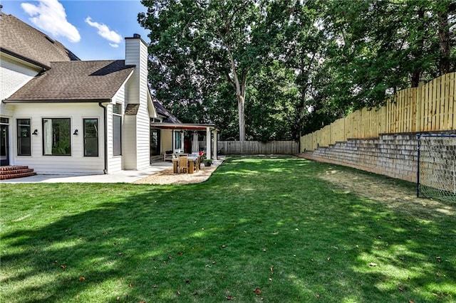 view of yard featuring a patio