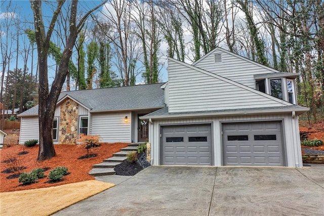 view of front of home with a garage