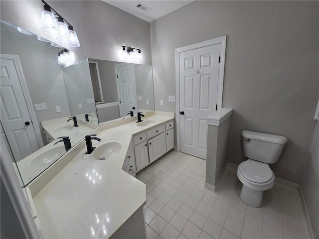 7910 Tintern Trce, Duluth, GA 30097 - bathroom featuring a sink, tile patterned floors, toilet, and visible vents
