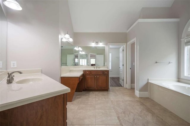 5737 Russell Ct, Douglasville, GA 30135 - full bath featuring tile patterned floors, two vanities, a bath, and a sink