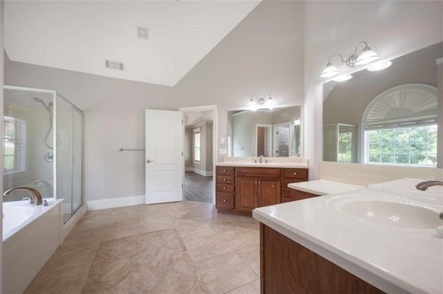 5737 Russell Ct, Douglasville, GA 30135 - full bathroom with a sink, visible vents, a stall shower, and a garden tub