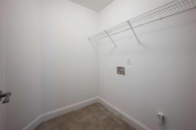 5737 Russell Ct, Douglasville, GA 30135 - clothes washing area featuring laundry area, baseboards, and washer hookup