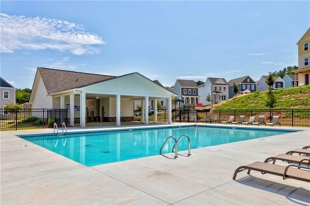 2676 Brookview Ln NW, Atlanta, GA 30318 - community pool with a residential view and a patio area