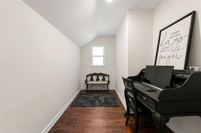 office area with lofted ceiling, baseboards, and dark wood-type flooring