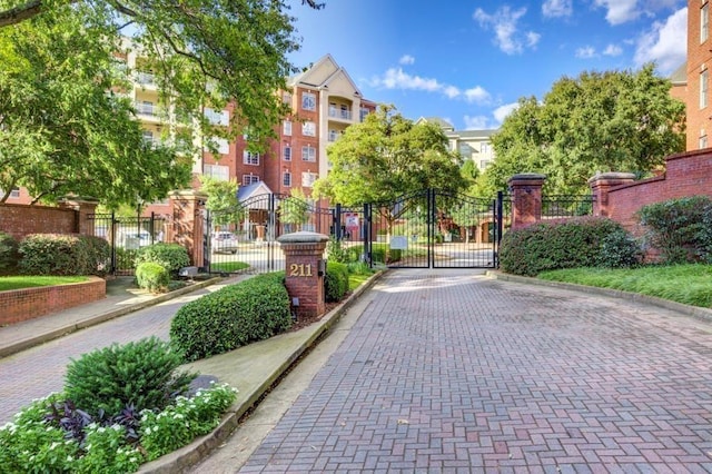 211 Colonial Homes Dr NW Unit 2501, Atlanta, GA 30309 - surrounding community featuring a gate