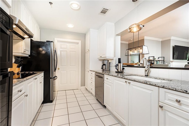 211 Colonial Homes Dr NW Unit 2501, Atlanta, GA 30309 - kitchen featuring a sink, black appliances, white cabinets, light tile patterned floors, and hanging light fixtures