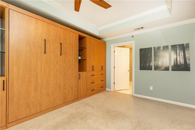 211 Colonial Homes Dr NW Unit 2501, Atlanta, GA 30309 - unfurnished bedroom with crown molding, carpet flooring, baseboards, ensuite bathroom, and a ceiling fan