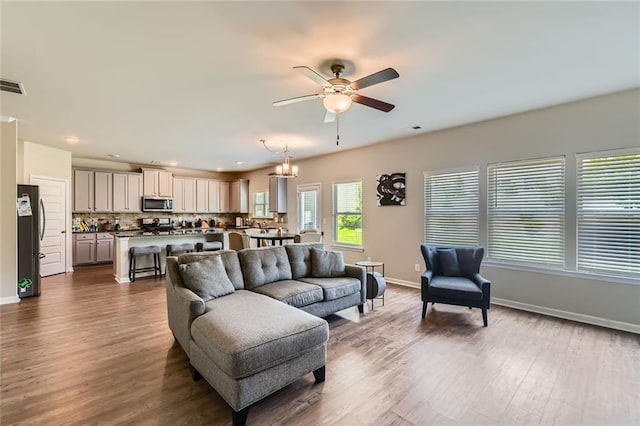 2486 Bear Mountain St, Lithonia, GA 30058 - living area with ceiling fan, dark wood-type flooring, and recessed lighting
