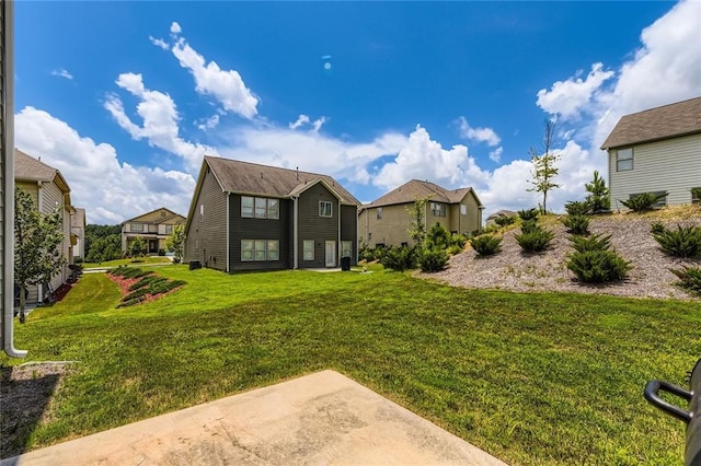 2486 Bear Mountain St, Lithonia, GA 30058 - rear view of property with a yard and a residential view
