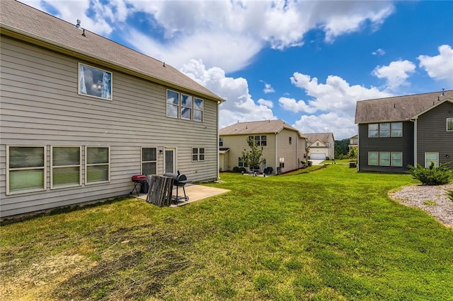 2486 Bear Mountain St, Lithonia, GA 30058 - rear view of property with a patio and a lawn