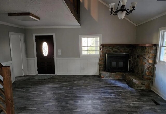 foyer with dark hardwood / wood-style floors, plenty of natural light, and lofted ceiling