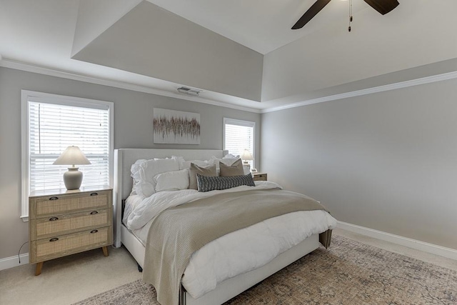 bedroom with ceiling fan, crown molding, and carpet