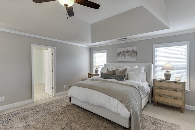 carpeted bedroom featuring ornamental molding, multiple windows, and ceiling fan