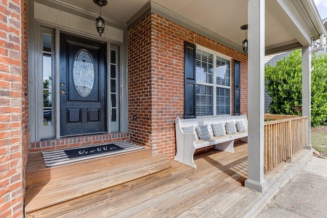 property entrance with covered porch