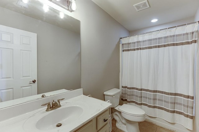 full bathroom with toilet, vanity, shower / bath combo with shower curtain, and tile patterned floors