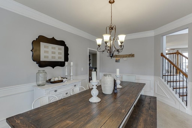 dining area featuring a notable chandelier, dark hardwood / wood-style floors, and crown molding