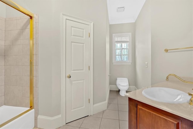 bathroom with tile patterned floors, visible vents, toilet, vanity, and baseboards