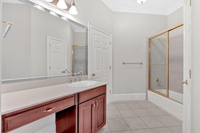 bathroom with vanity, ornamental molding, tile patterned flooring, and bath / shower combo with glass door