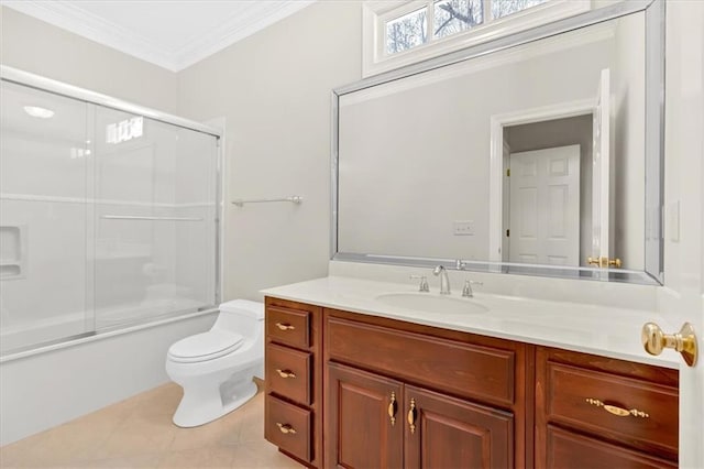 bathroom featuring tile patterned floors, enclosed tub / shower combo, toilet, vanity, and ornamental molding